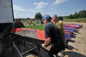 Reburial of unidentified dead civilians in Buchа