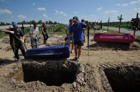 Reburial of unidentified dead civilians in Buchа