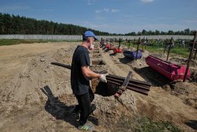 Reburial of unidentified dead civilians in Buchа