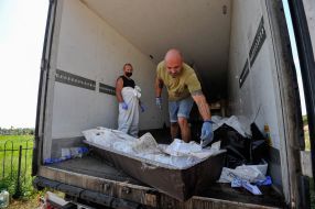 Reburial of unidentified dead civilians in Buchа