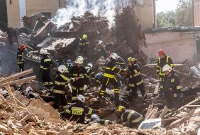 Rescuers clear the blockage of the house