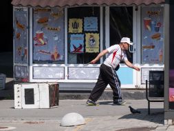 A man pulls a gas stove