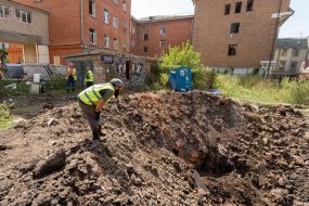 A crater near a school hit by a Russian S-300 missile explosion