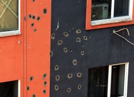 Traces of shell fragments on the building