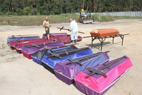 Burial of unidentified bodies of people who died and died during the occupation at the city cemetery in Bucha
