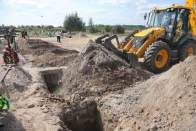 Burial of unidentified bodies of people who died and died during the occupation at the city cemetery in Bucha