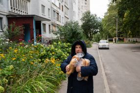 A woman carries bread