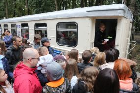 Passengers near the train at the Kyiv Children's Passenger Railway station
