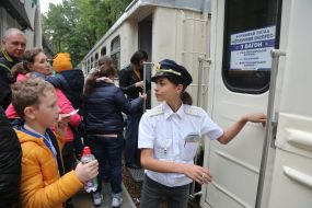 Passengers near the train at the Kyiv Children's Passenger Railway station