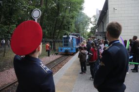 People on the platform near the station of the "Kyiv Passenger Children's" station of the Kyiv Children's Railway