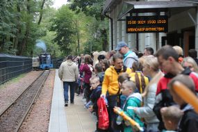 People on the platform near the station of the "Kyiv Passenger Children's" station of the Kyiv Children's Railway
