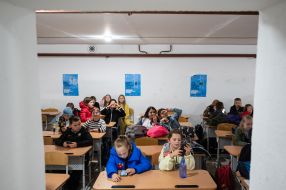 Schoolchildren took shelter during an air raid in the secondary school of the village of Mykhailivka-Rubezhivka near Irpen