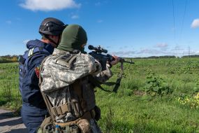 A Ukrainian sniper shoots Russian anti-personnel mines  in Balakleya city of Kharkiv region