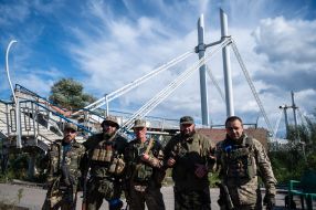 Ukrainian servicemen in the de-occupied city of Izyum