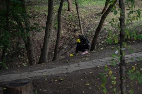 The woman lays flowers