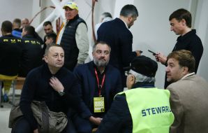 Andriy Pavelko waits for the start of the football match in the bomb shelter of the "Avangard" stadium in Rivne