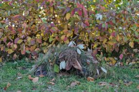 Participant of military training for civilians in a special camouflage suit in Lviv