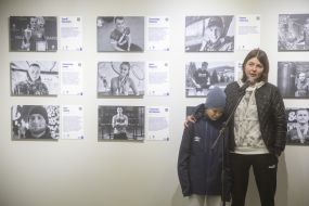 The wife of sportsman Andrii Kotovenka Tetyana with her son