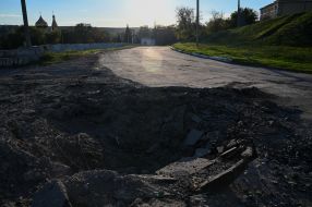 Road damaged by explosions in Kupyansk
