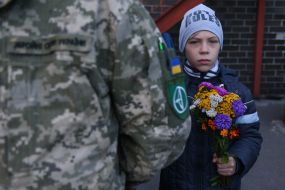 The boy with flowers