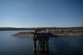 The destroyed bridge across the Siverskyi Donets river