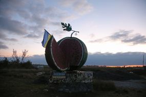 The shelled memorial sign "Gifts of the Kherson region" (monument to the Kherson watermelon)