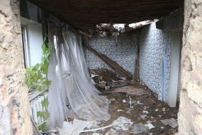 Destroyed residential building in  Vysokopolye village