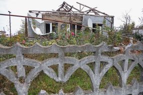 Destroyed residential building in  Vysokopolye village