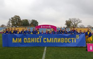 Players of FC "Metallist" and FC "Metallist-1925"