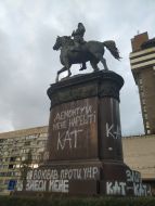 A monument to Mykola Shchors in Kyiv painted with the inscriptions "Executioner" and "Criminal"