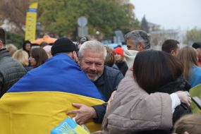 Residents of Kherson, who evacuated to Odessa, celebrate the liberation of their native city near the Opera House