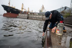 People draw water from the Dnipro in de-occupied Kherson