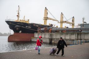 People draw water from the Dnipro in de-occupied Kherson