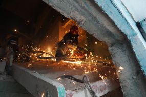 Dismantling the rubble of destroyed buildings in Kharkov