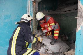 Dismantling the rubble of destroyed buildings in Kharkov