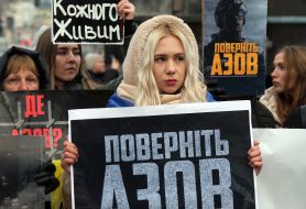 People are holding placards