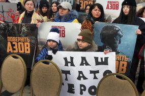 People are holding placards