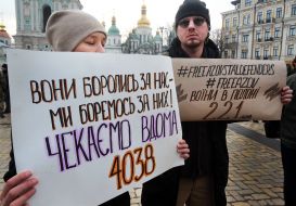 People are holding placards