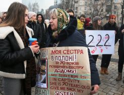 People are holding placards