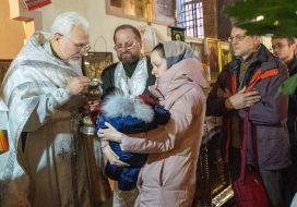 Parishioners receive Holy Communion