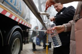 People gather water on the territory of the Kyiv Pechersk Lavra