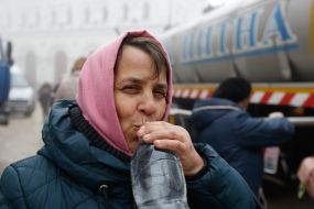 People gather water on the territory of the Kyiv Pechersk Lavra