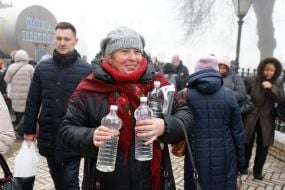 People gather water on the territory of the Kyiv Pechersk Lavra