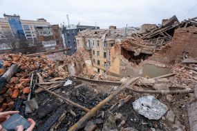 The roof of a residential building destroyed by shelling