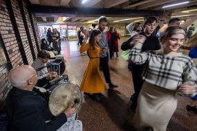 Young people dance in an underpass near the Teatralna metro station in Kyiv