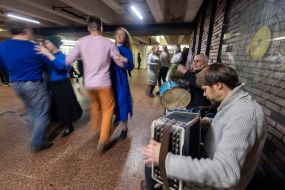 Young people dance in an underpass near the Teatralna metro station in Kyiv