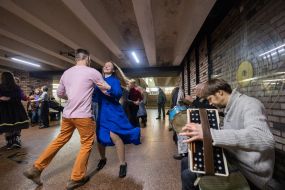Young people dance in an underpass near the Teatralna metro station in Kyiv