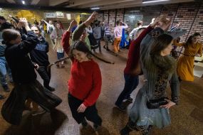 Young people dance in an underpass near the Teatralna metro station in Kyiv