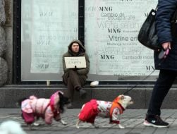 A man begs for alms