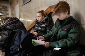 Teachers and students conduct lessons in the subway during a rocket attack
